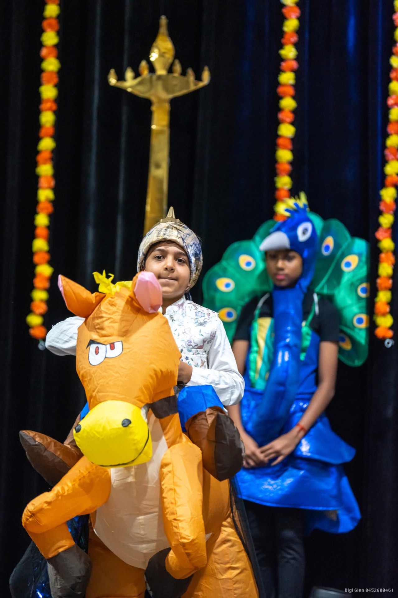Children dressed as a horse and peacock for a school play