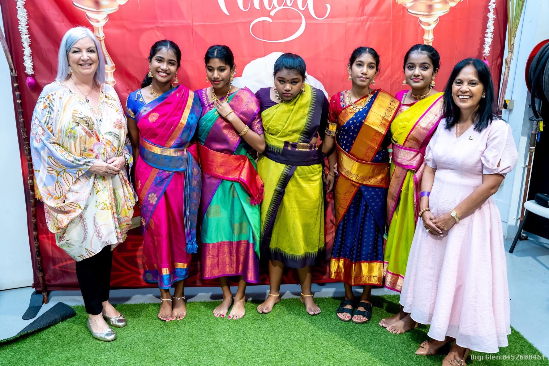 Group of girls and hosts at the Pongal celebration