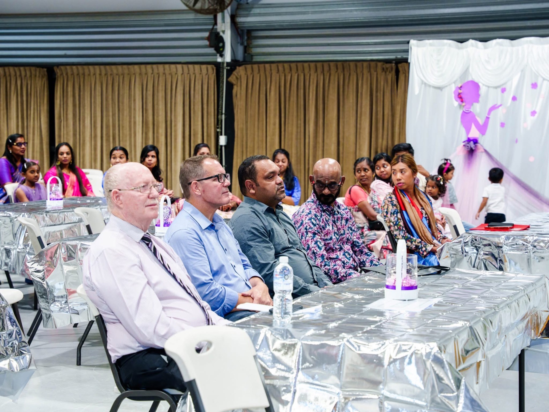 Audience seated at the Women's Day celebration